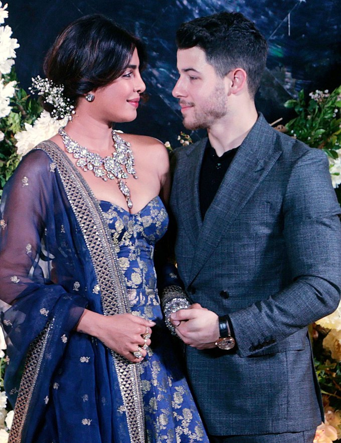Nick Jonas and Priyanka Chopra gaze at each other at their wedding reception