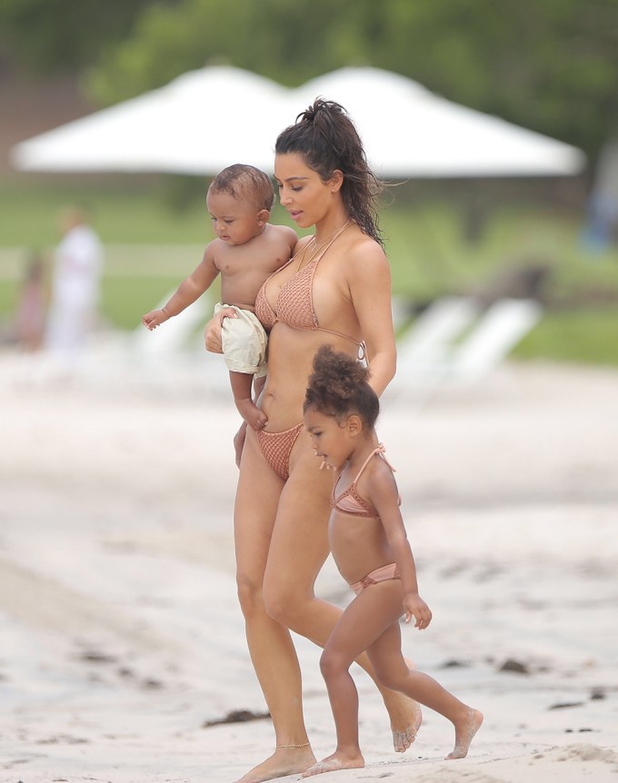 Kim Kardashian Plays With Children On Beach Day