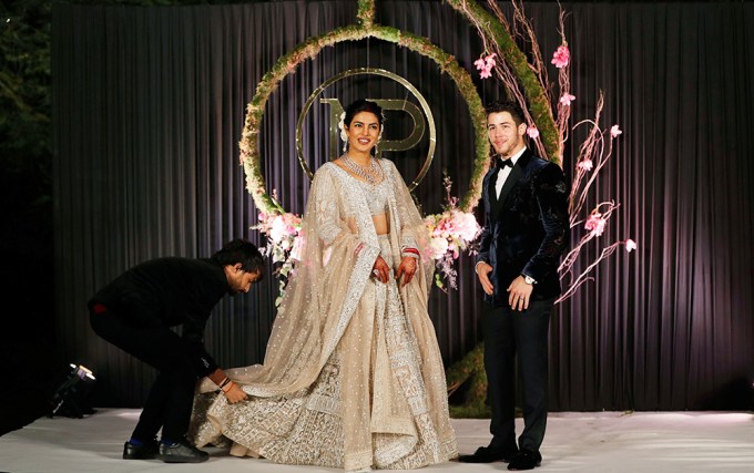 Priyanka gets her dress fixed for photos