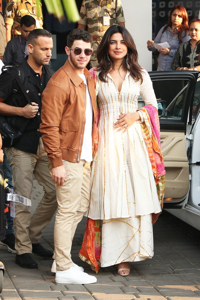 Nick Jonas & Priyanka Chopra greeting photographers before their wedding