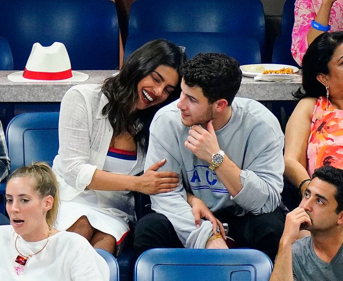 Nick Jonas & Priyanka Chopra’ Cuddle At A Tennis Match