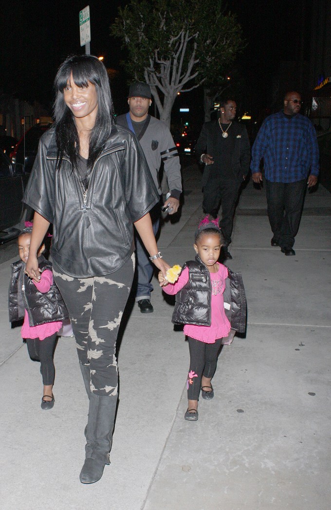 Kim Porter and her twin daughters walking in West Hollywood, CA
