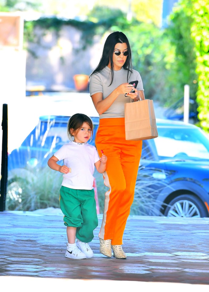 Kourtney Kardashian visits a toy store and heads to launch with son Reign in Malibu