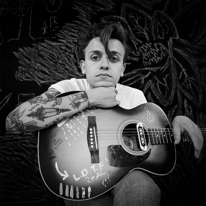 Scott Helman Poses With His Guitar