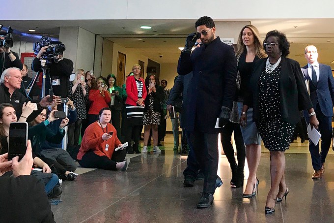 Jussie Smollett arrives at a news conference