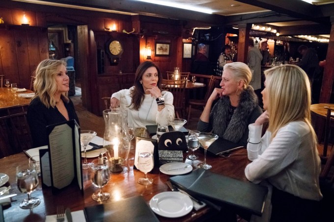 ‘The Real Housewives of New York City’ cast sit at a table