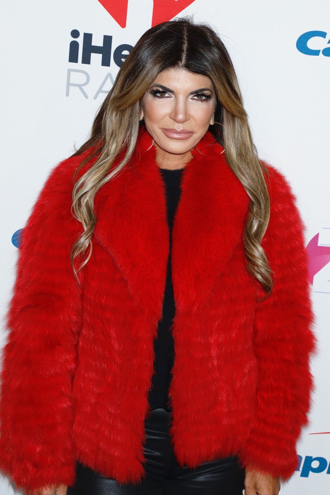 Teresa Giudicee in a red fuzzy jacket