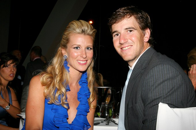 Eli Manning & Abby McGrew at an event