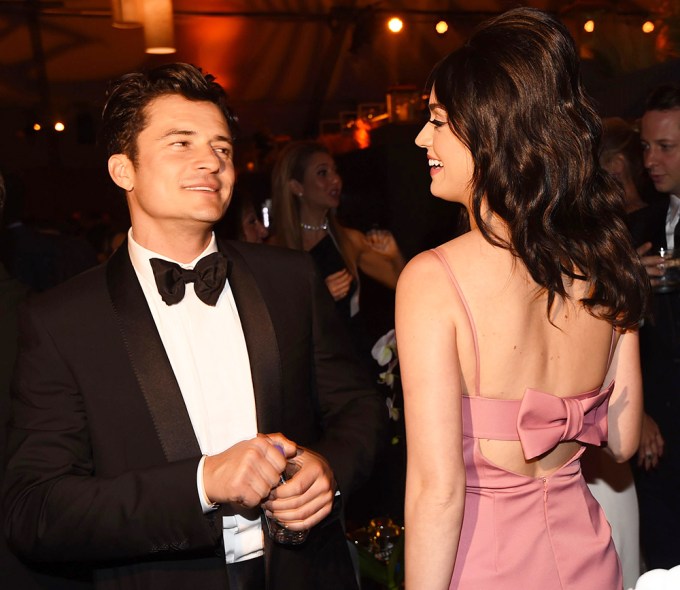 Katy Perry & Orlando Bloom look at each other