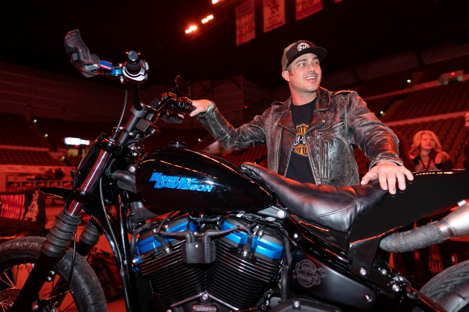 Taylor Kinney Checking out a Harley-Davidson Brewtown Throwdown Bike