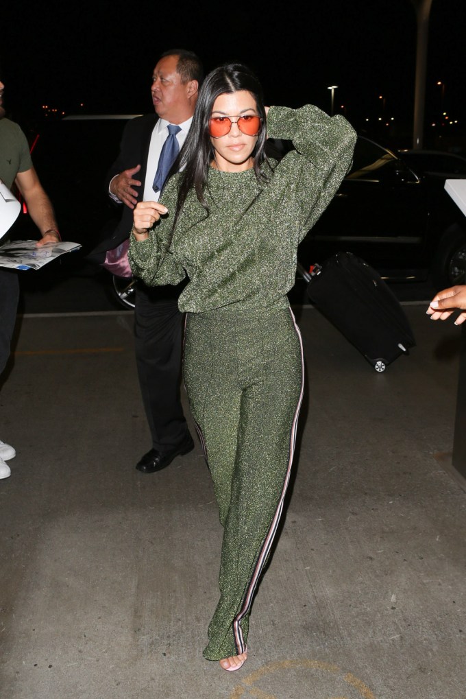 Kourtney Kardashian glitters in green