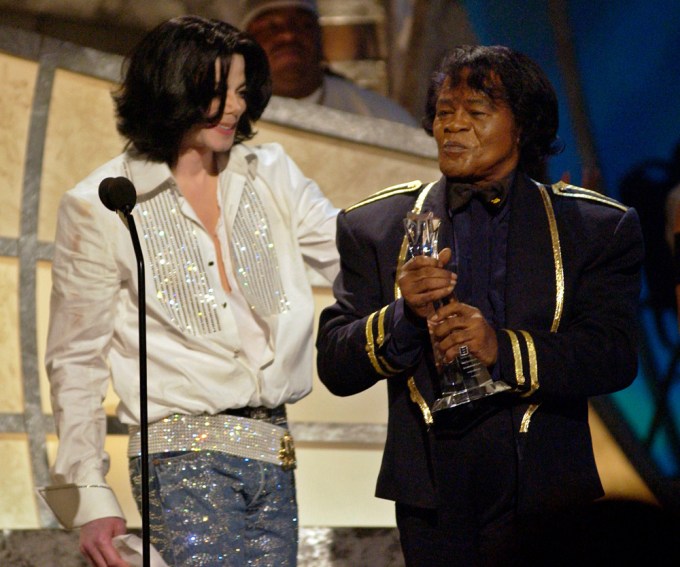 Michael Jackson presents James Brown with an award