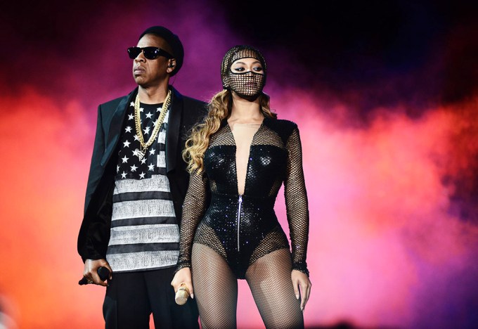 Beyonce & Jay-Z pose on stage