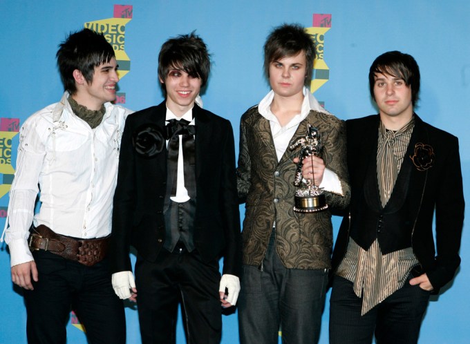 Brendon Urie with his band members