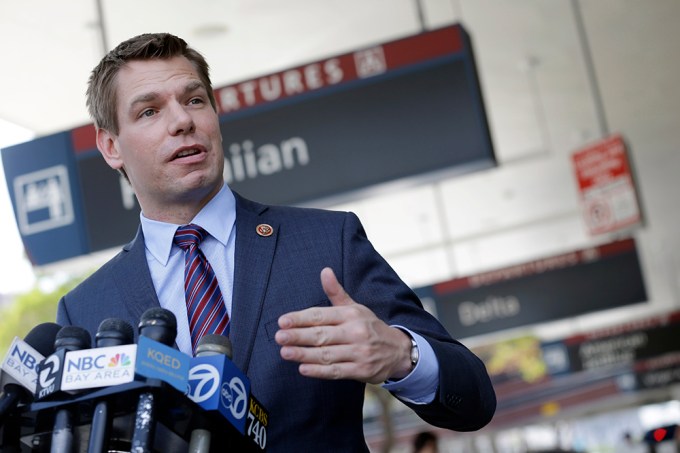 Eric Swalwell holxs a news conference