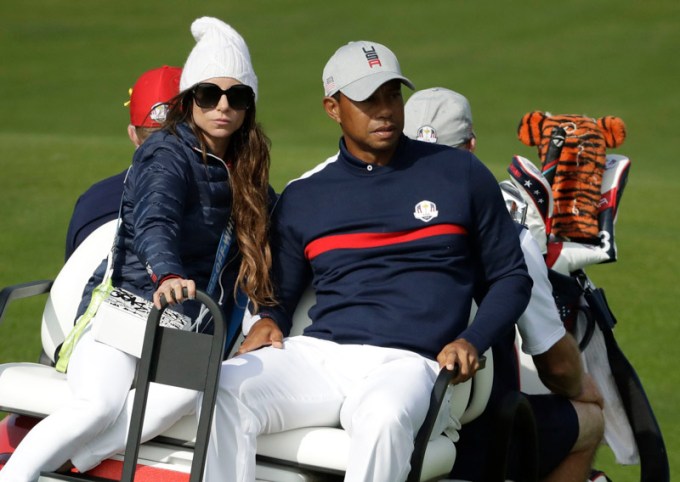 Tiger Woods & Erica Herman on a golf cart
