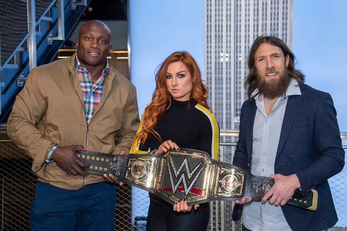 Becky Lynch with a wrestling belt