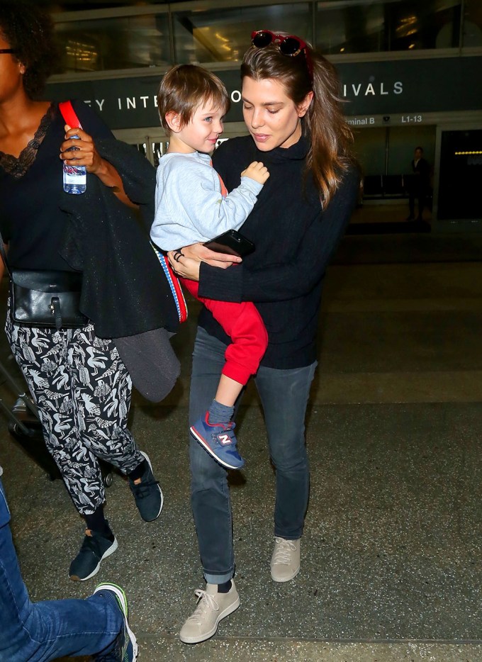 Charlotte Casiraghi holds her son at LAX