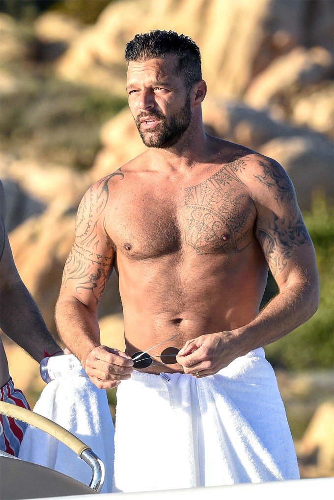 Ricky Martin wrapped in a towel