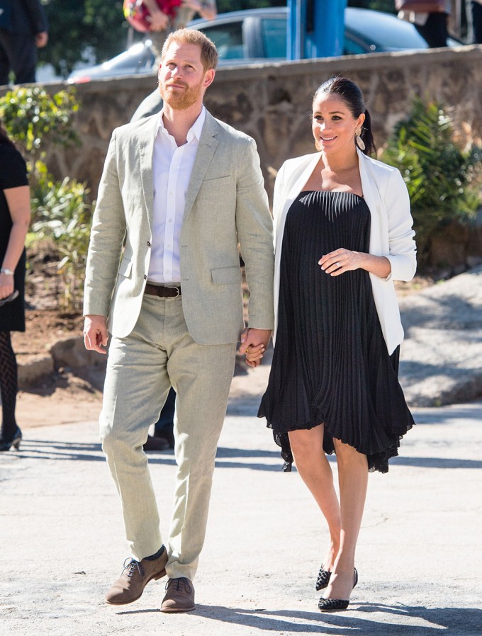 Meghan Markle & Prince Harry Hold Hands During Their Morocco Trip