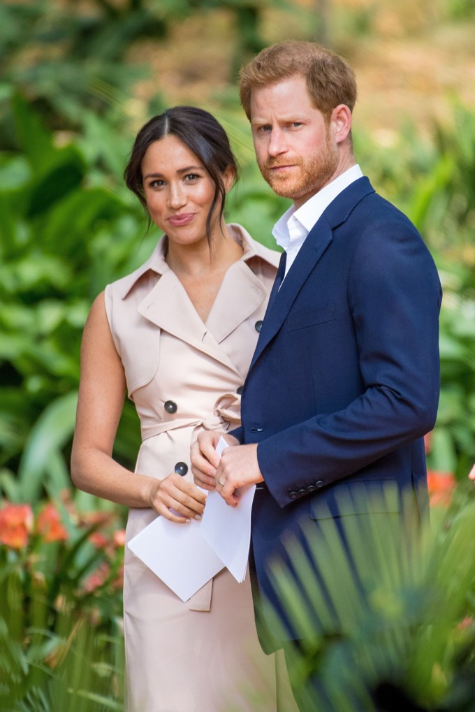 Prince Harry & Meghan Markle Standing With One Another
