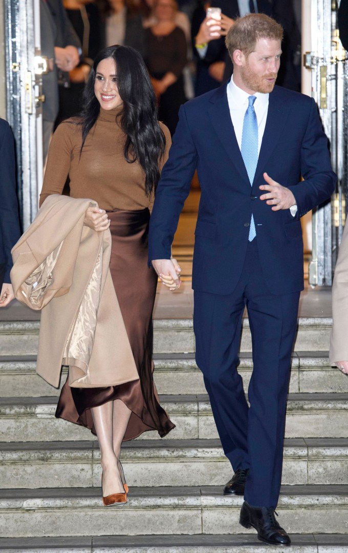 Prince Harry & Meghan Markle Hold Hands At Canada House