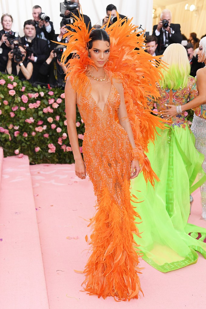 Kendall Jenner Brings Out The Orange Feathers