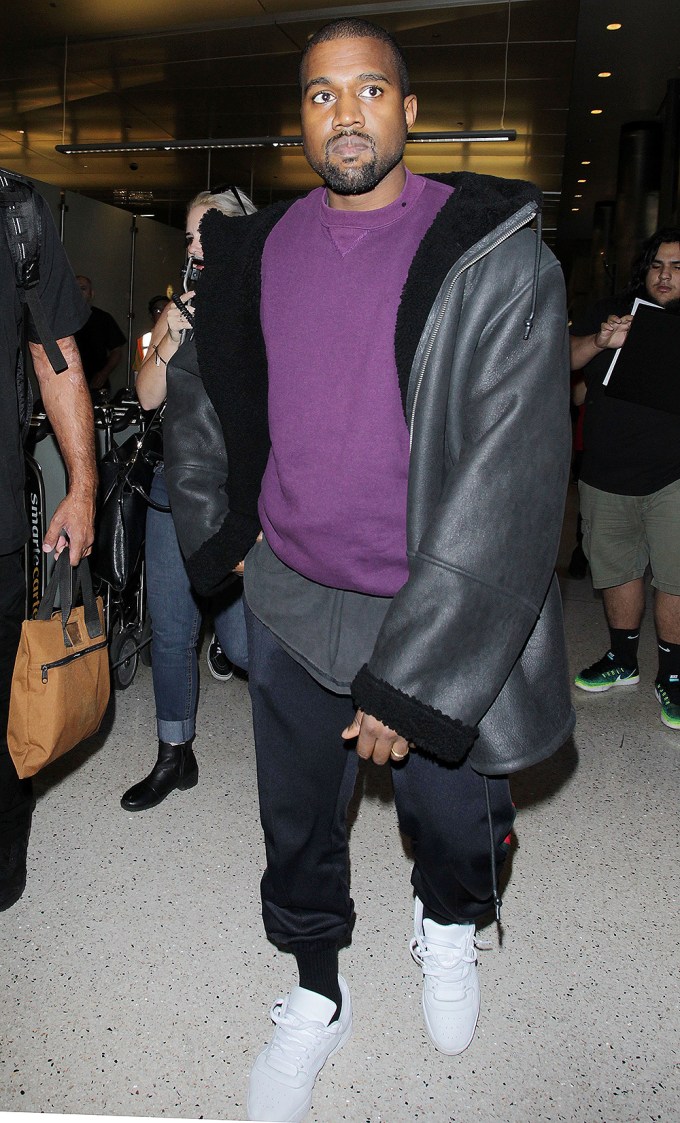 Kanye West in an oversized jacket at LAX
