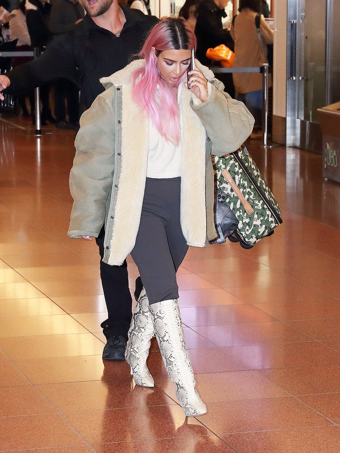 Kim Kardashian in Yeezy at the airport in Japan