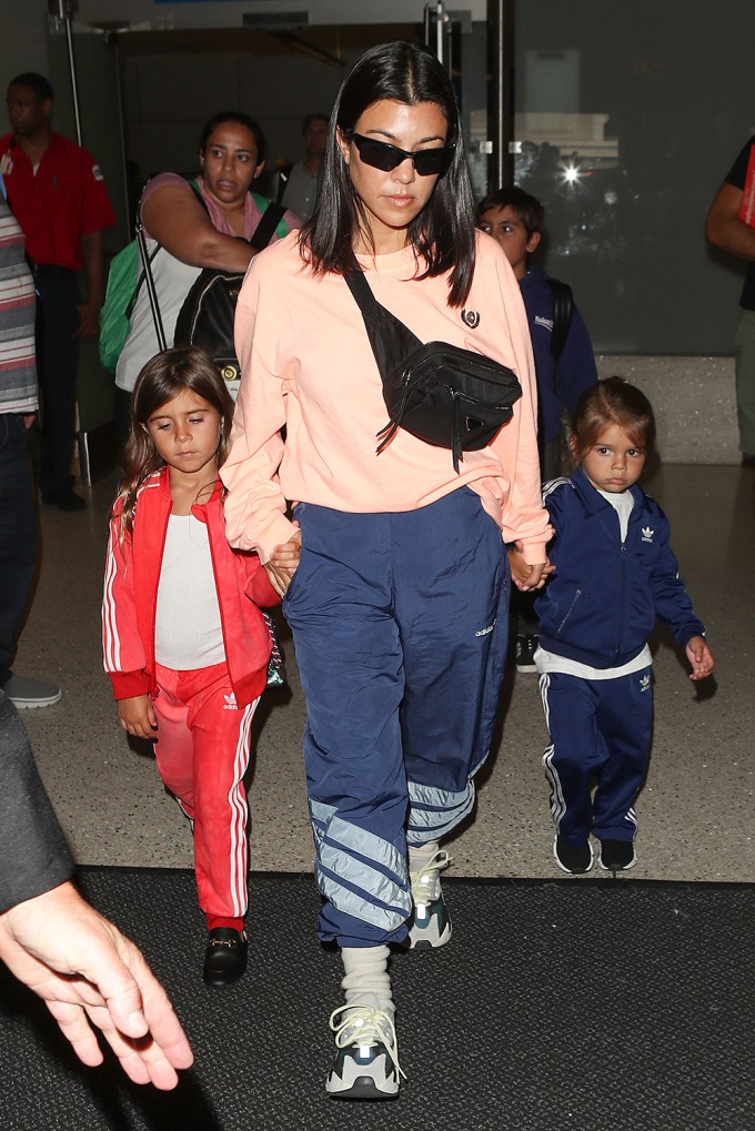 Kourtney Kardashian & kids in Adidas at LAX
