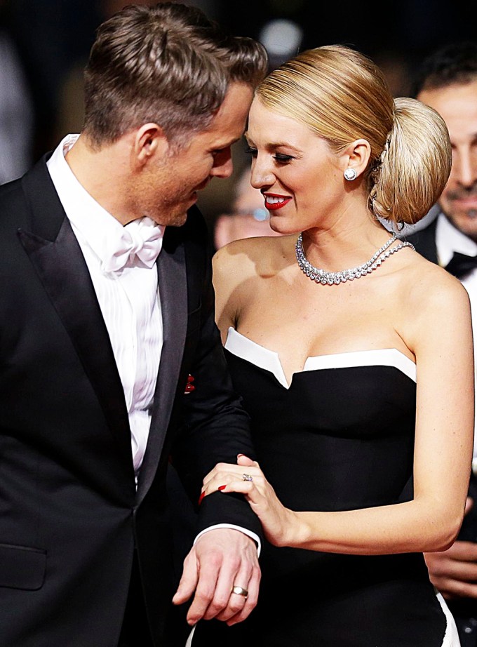 Ryan Reynolds & Blake Lively smile at each other
