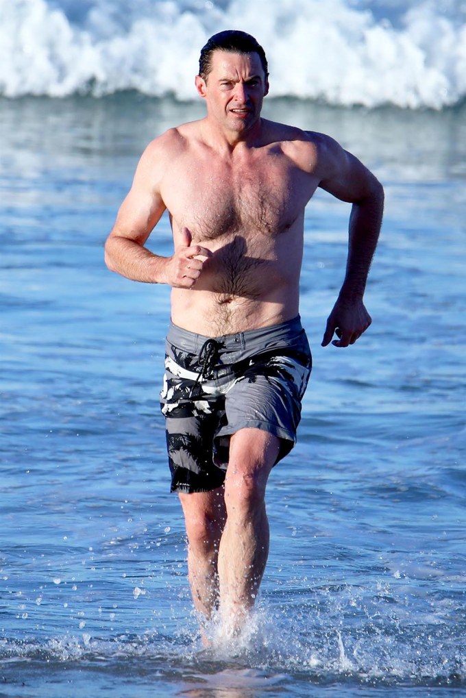 Hugh Jackman runs in the water