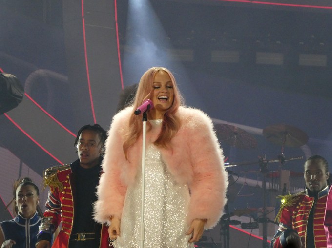 Baby Spice Emma Bunton in a pink fuzzy coat on the Spice Girls Reunion Tour.