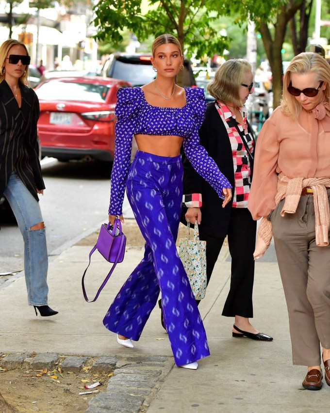 Hailey Baldwin wears a blue crop top while out with family