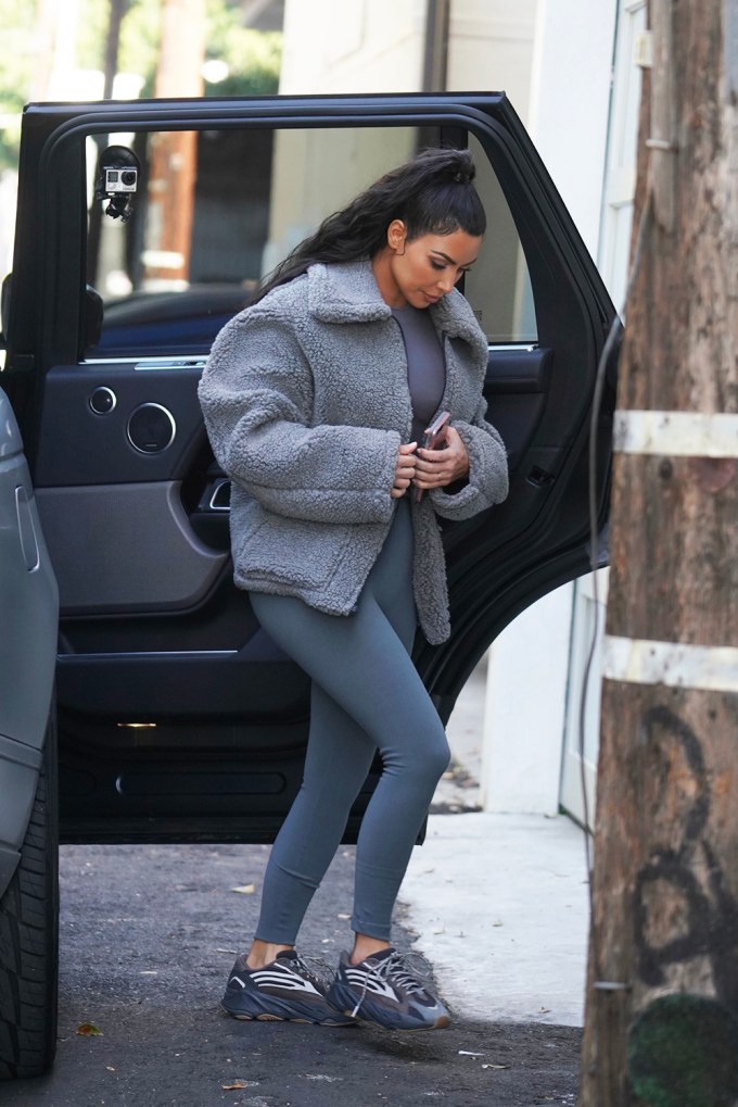 Kim Kardashian In Leggings & An Oversized Jacket