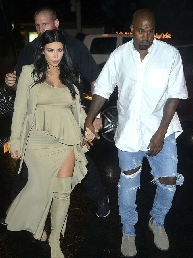 Kim Kardashian & Kanye West holding hands