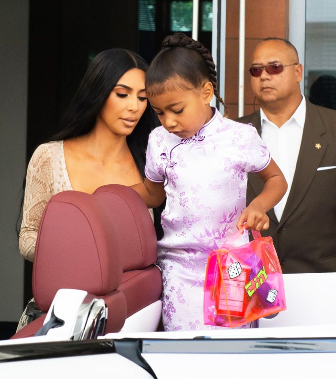 North West In A Purple Dress