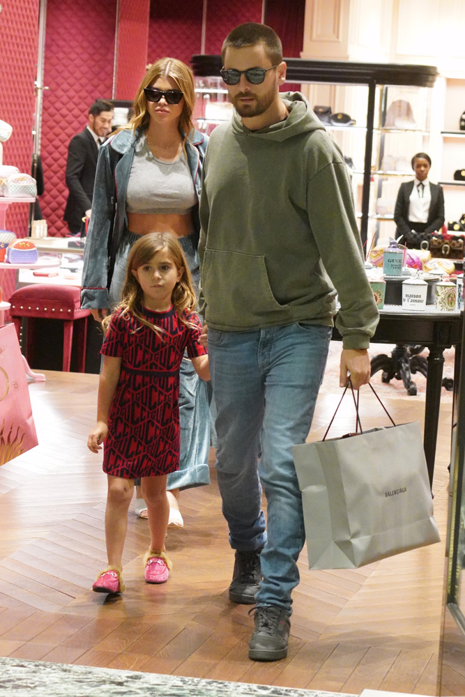 Scott Disick & Sofia Richie With Penelope Disick in a store