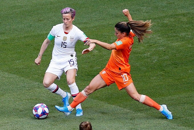 United States’ Megan Rapinoe & Netherlands’ Danielle Van De Donk fight for the ball