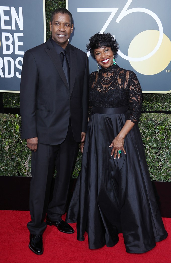 Denzel Washington and Pauletta Washington pose together