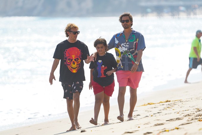Scott Disick With Son Mason & Jonathan Cheban on a beach