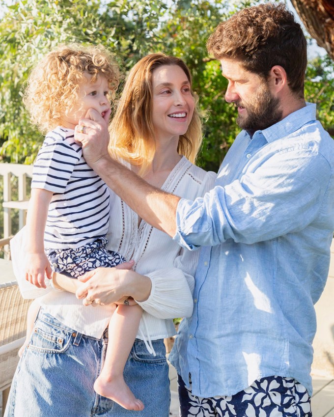 Whitney Port poses with husband, Tim and 2 year old son, Sonny