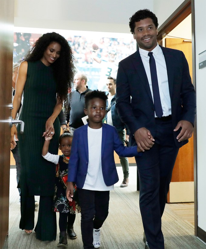 Ciara & Russell Wilson Holding Hands With Their Kids
