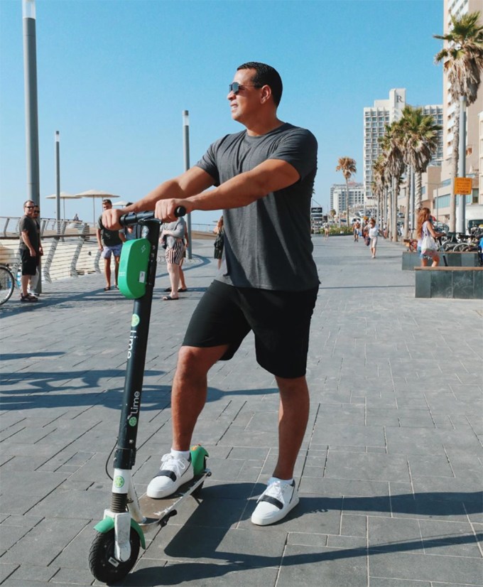 Alex Rodriquez riding scooter in Tel Aviv