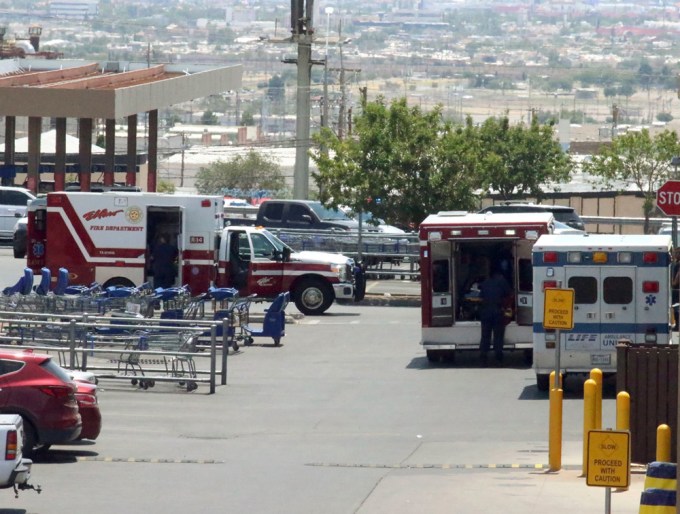 Ambulances stage at the Walmart shooting scene