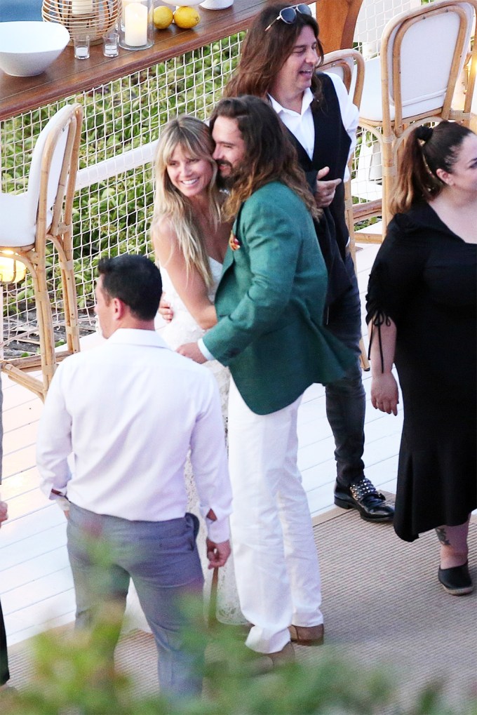 Heidi Klum & Tom Kaulitz Get Cozy At Reception