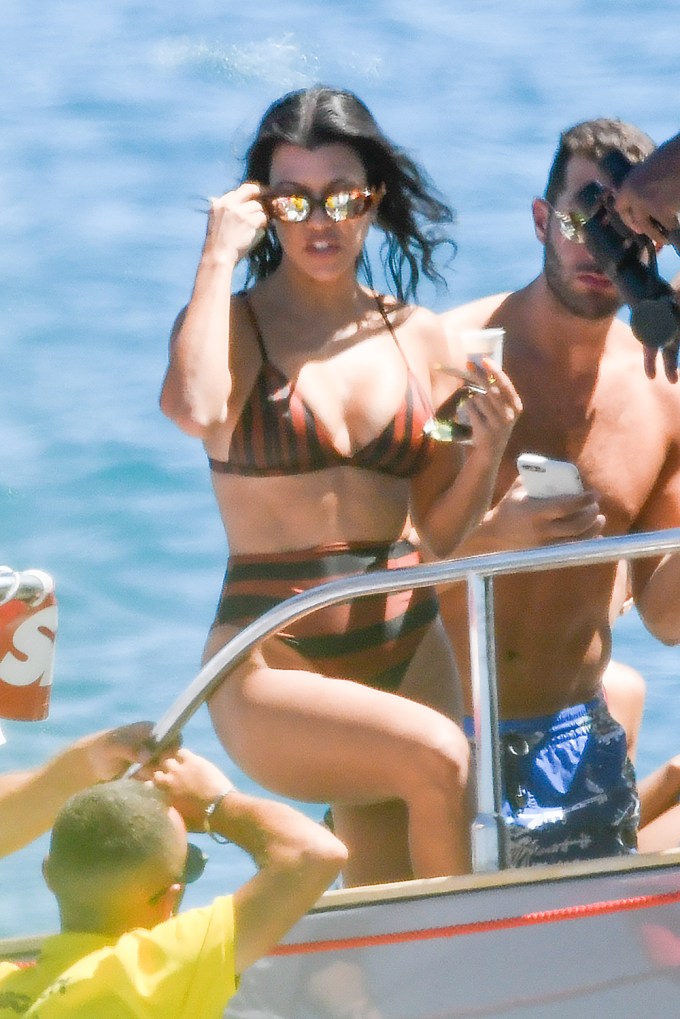 Kourtney Kardashian yachting in Sardinia