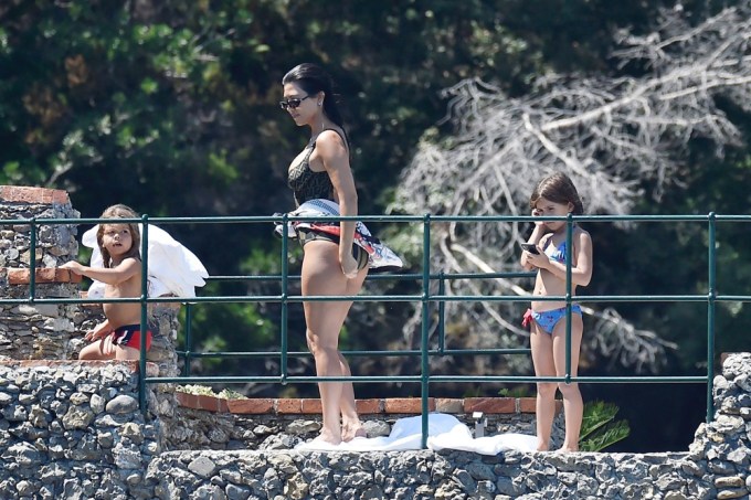 Kourtney Kardashian walks with her kids in Italy