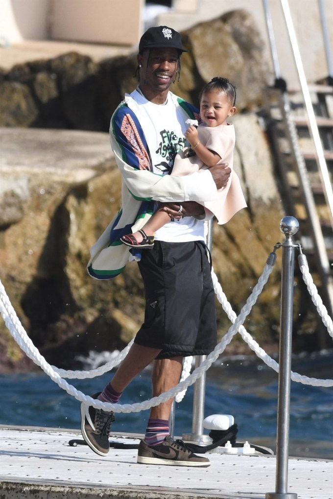 Travis Scott and daughter Stormi arrive for lunch in France