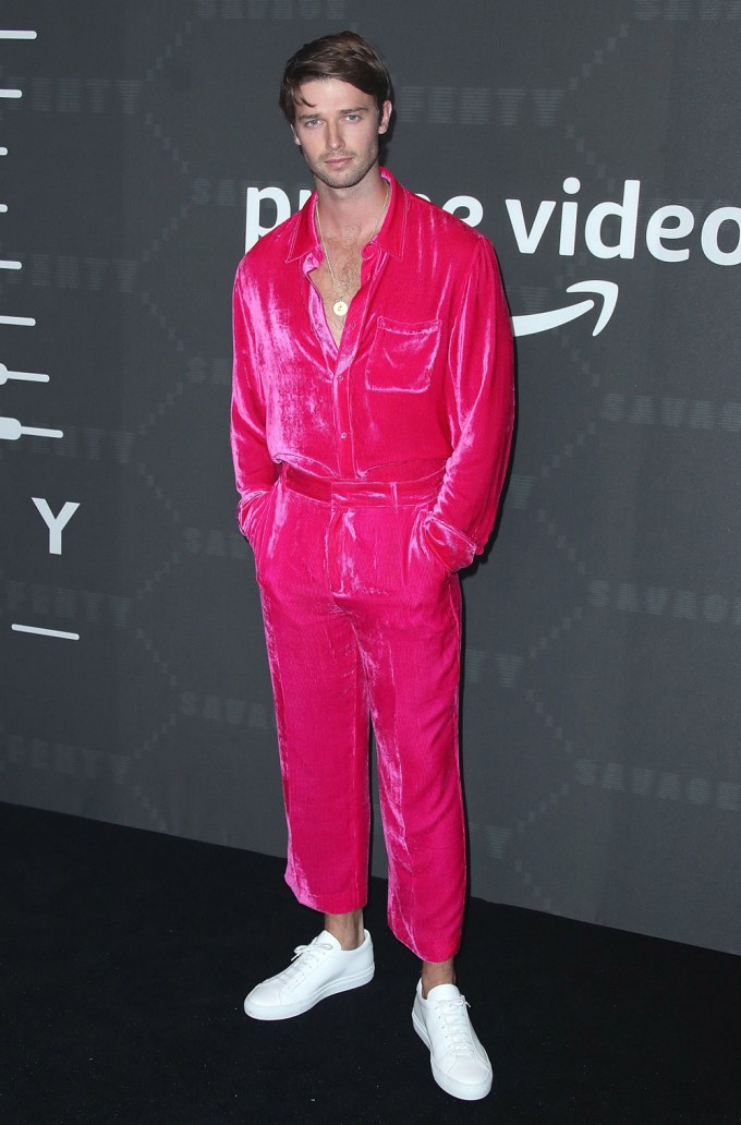Patrick Schwarzenegger Pops In Pink On Savage x Fenty Red Carpet